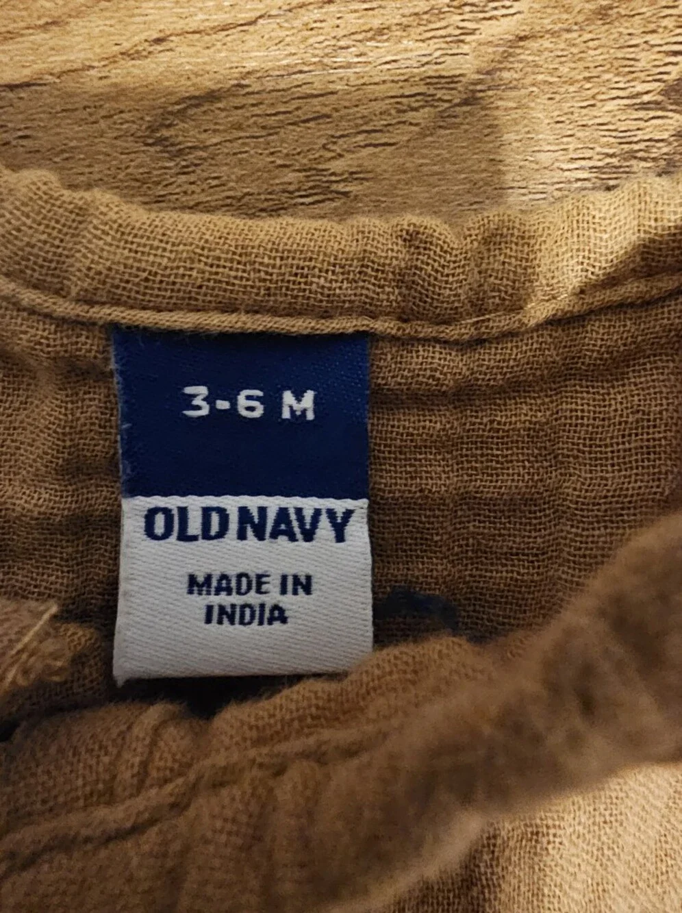 Old Navy Sleeveless Muslin Baby Romper in Mustard